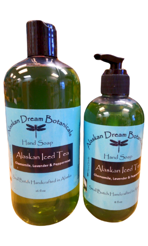 Two bottles of Alaskan Dream Botanicals hand soap with a white background